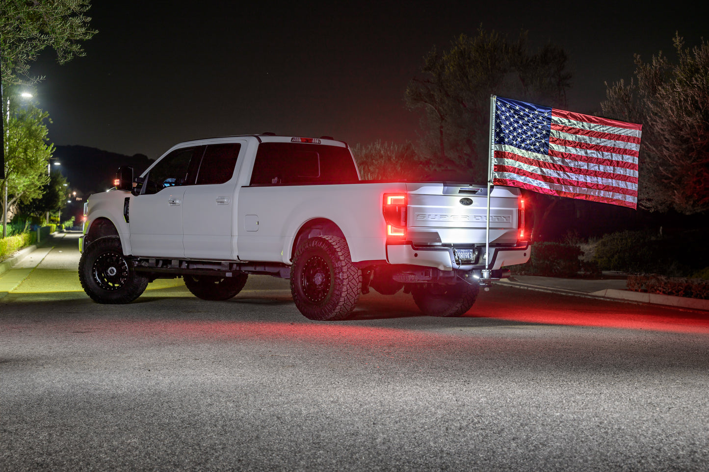 An American flag on the Quick Ball Mount, illuminated by a GP10 light on the step/light mount.