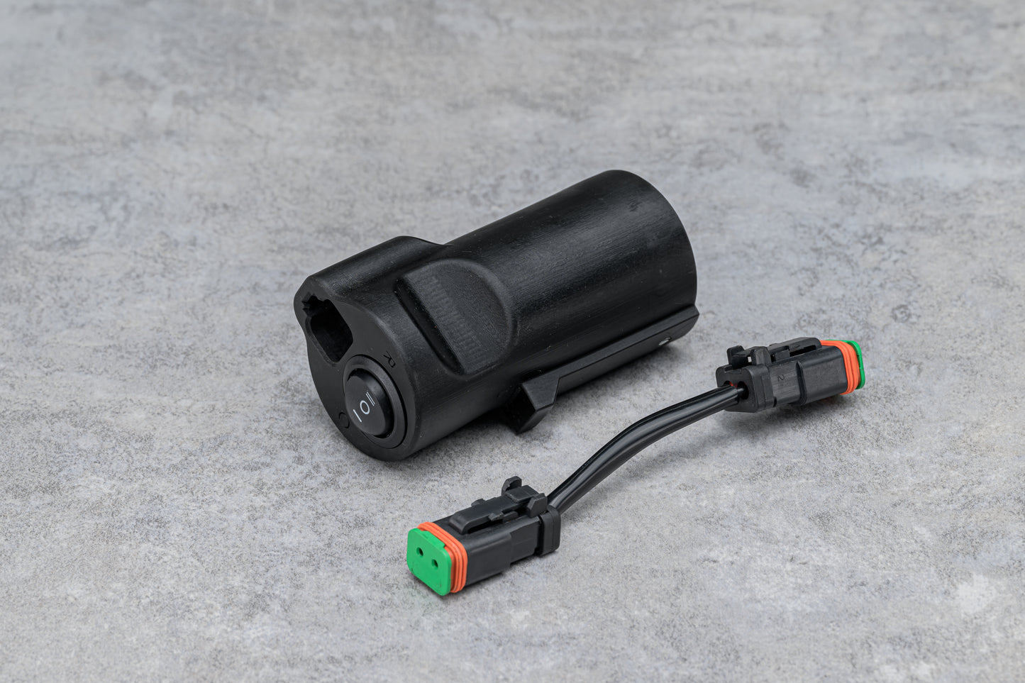 The Hitch Switch next to the included double-sided 5" DT connector.