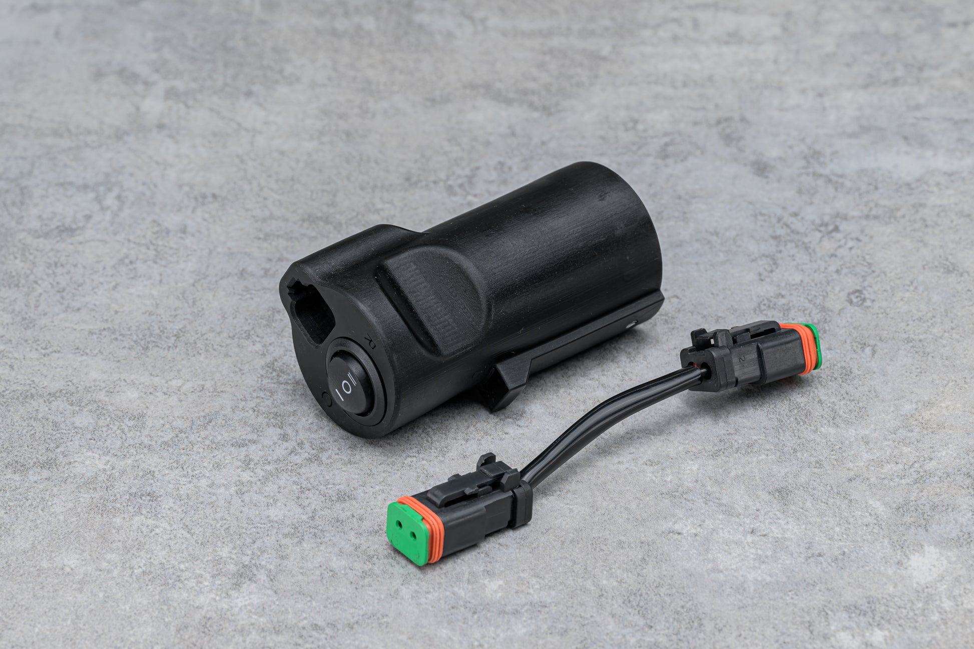 The Hitch Switch next to the included double-sided 5" DT connector.